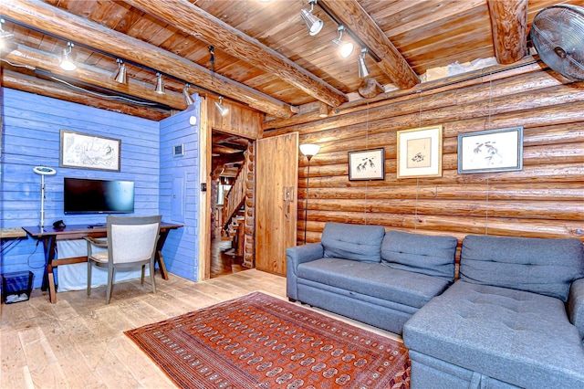 4126 Burrows Rd, Zephyrhills, FL 33542 - living area featuring beamed ceiling, wooden ceiling, stairway, track lighting, and hardwood / wood-style floors