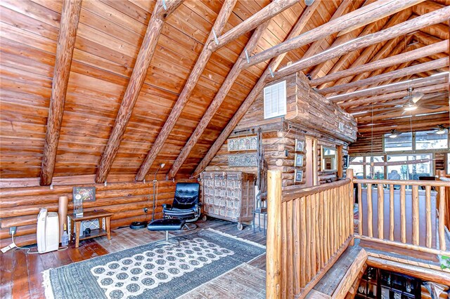 4126 Burrows Rd, Zephyrhills, FL 33542 - interior space featuring wooden ceiling, rustic walls, vaulted ceiling with beams, and hardwood / wood-style flooring