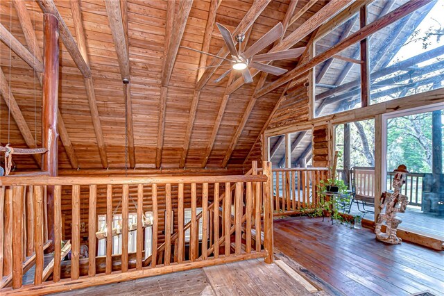 4126 Burrows Rd, Zephyrhills, FL 33542 - interior space with wooden ceiling, ceiling fan, vaulted ceiling with beams, and hardwood / wood-style floors