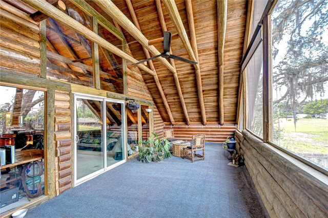 4126 Burrows Rd, Zephyrhills, FL 33542 - unfurnished sunroom featuring beam ceiling