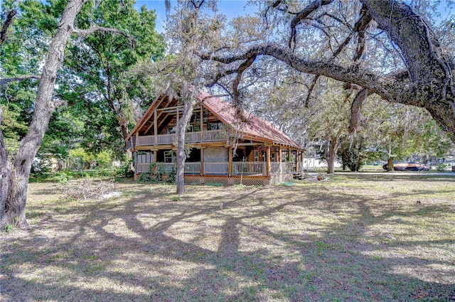 4126 Burrows Rd, Zephyrhills, FL 33542 - view of front facade featuring a deck and a porch