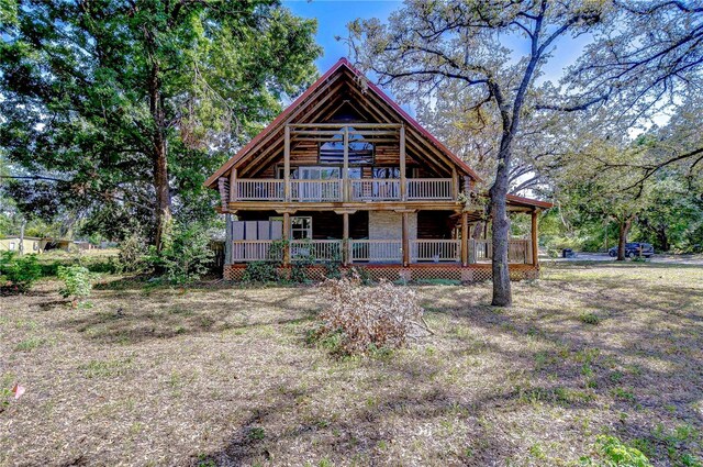 4126 Burrows Rd, Zephyrhills, FL 33542 - rear view of house featuring a wooden deck