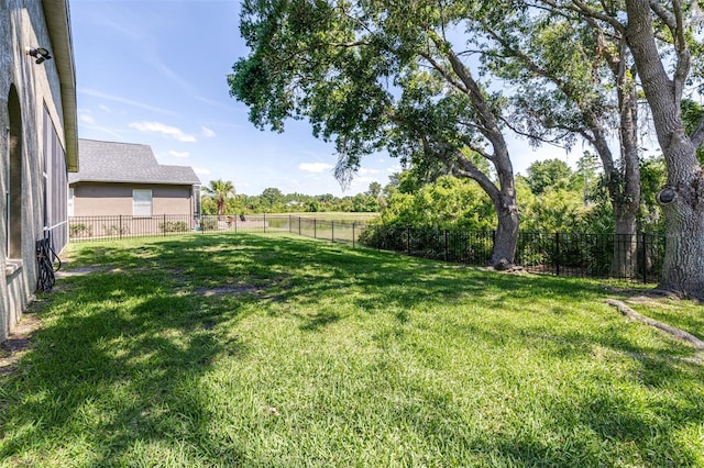view of yard with a fenced backyard
