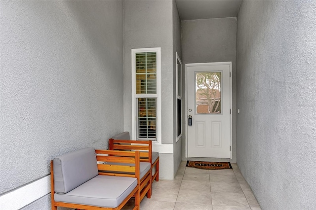property entrance featuring stucco siding
