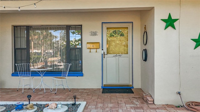 5100 Aragon Way S, Saint Petersburg, FL 33705 - view of exterior entry featuring stucco siding