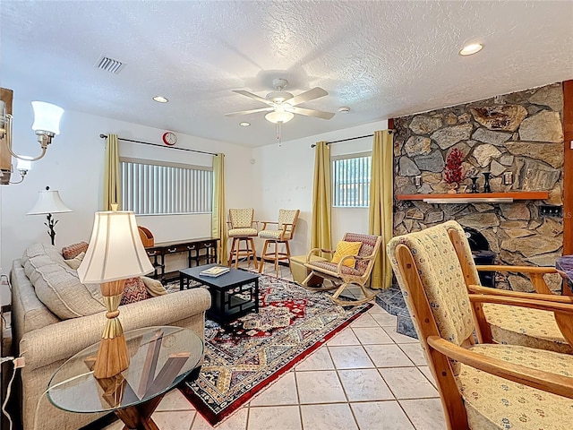 5100 Aragon Way S, Saint Petersburg, FL 33705 - living room with a textured ceiling, visible vents, recessed lighting, a ceiling fan, and light tile patterned floors