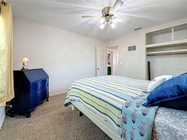 5100 Aragon Way S, Saint Petersburg, FL 33705 - bedroom with a textured ceiling, visible vents, ceiling fan, and carpet floors