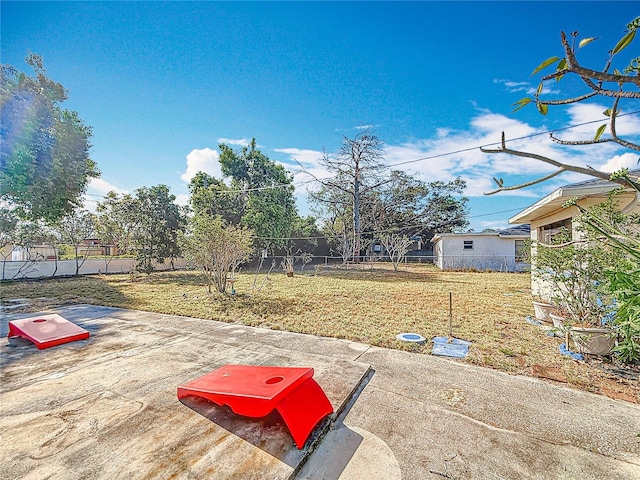 5100 Aragon Way S, Saint Petersburg, FL 33705 - view of yard featuring a patio area and fence