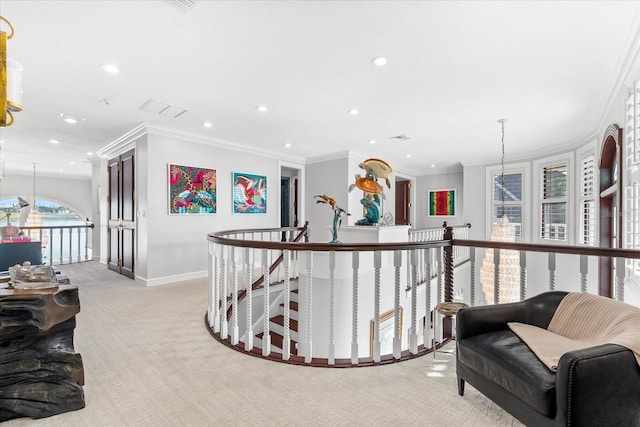 429 St Andrews Dr, Belleair, FL 33756 - hall featuring an upstairs landing, light colored carpet, recessed lighting, crown molding, and baseboards