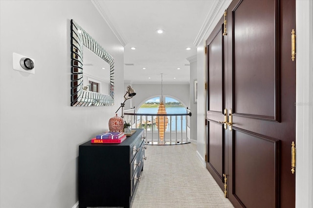 429 St Andrews Dr, Belleair, FL 33756 - hallway featuring ornamental molding, a water view, light colored carpet, baseboards, and recessed lighting