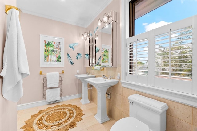 429 St Andrews Dr, Belleair, FL 33756 - bathroom with toilet, tile patterned flooring, baseboards, ornamental molding, and a sink