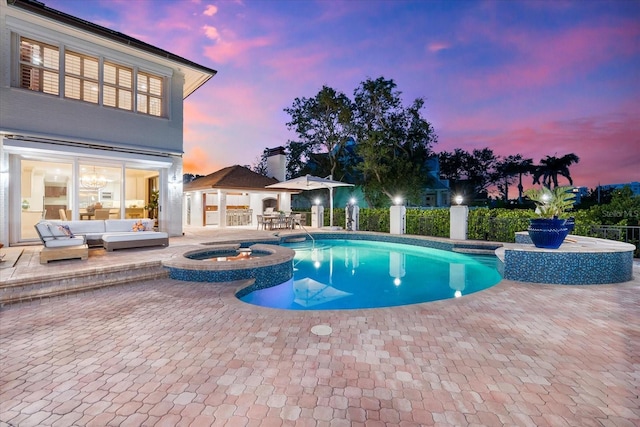 429 St Andrews Dr, Belleair, FL 33756 - view of pool featuring a patio, an outdoor living space, and a pool with connected hot tub
