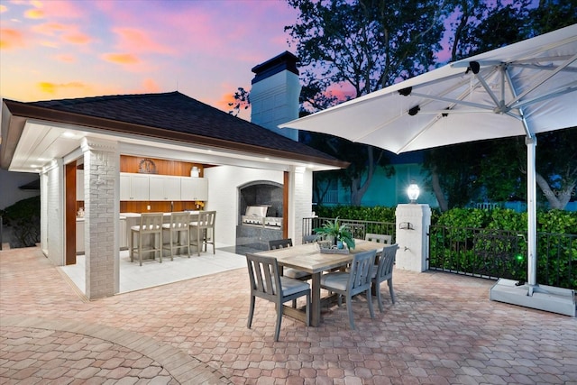 429 St Andrews Dr, Belleair, FL 33756 - view of patio with exterior bar, outdoor dining space, and a gazebo