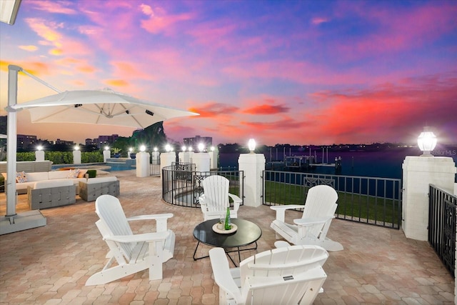 429 St Andrews Dr, Belleair, FL 33756 - patio terrace at dusk with a patio area