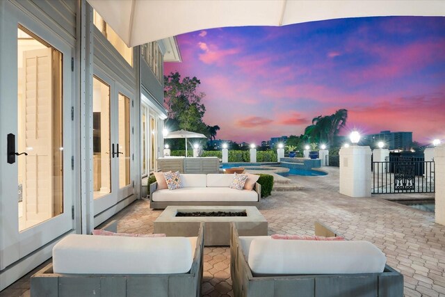 429 St Andrews Dr, Belleair, FL 33756 - view of patio featuring an outdoor living space with a fire pit