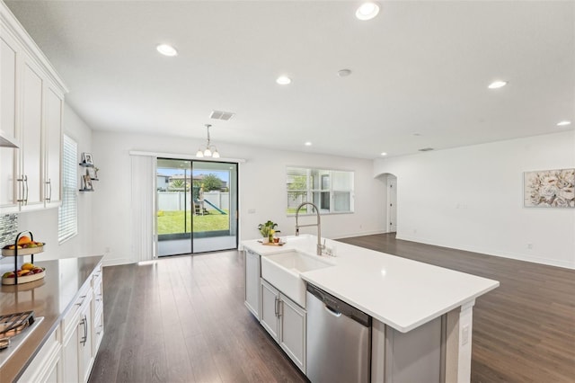 1741 Cherry Walk Rd, Lutz, FL 33558 - kitchen featuring recessed lighting, arched walkways, stainless steel appliances, a sink, and visible vents