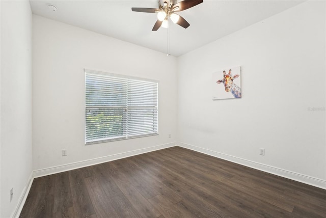 1741 Cherry Walk Rd, Lutz, FL 33558 - empty room featuring dark wood-style flooring, a ceiling fan, and baseboards