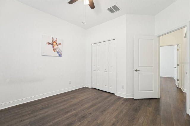 1741 Cherry Walk Rd, Lutz, FL 33558 - unfurnished bedroom featuring dark wood finished floors, a closet, baseboards, visible vents, and a ceiling fan