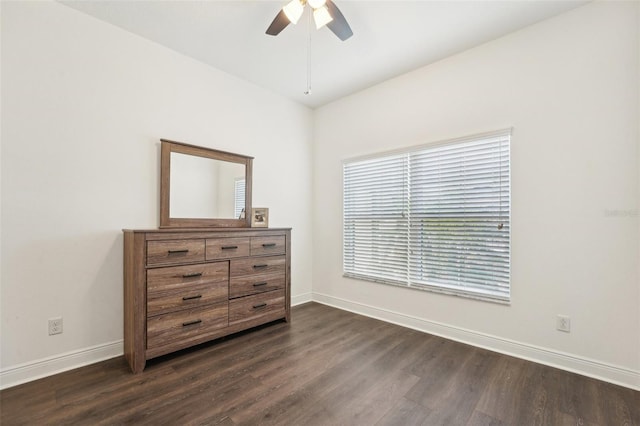 1741 Cherry Walk Rd, Lutz, FL 33558 - bedroom with dark wood-type flooring, a ceiling fan, and baseboards