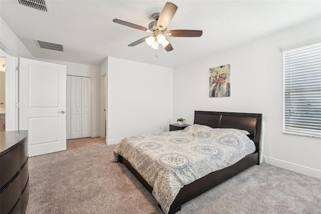 1741 Cherry Walk Rd, Lutz, FL 33558 - carpeted bedroom featuring baseboards, visible vents, ceiling fan, and a closet