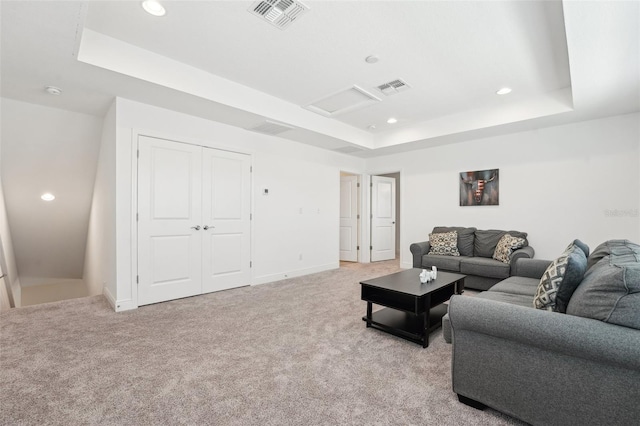 1741 Cherry Walk Rd, Lutz, FL 33558 - living room with visible vents, recessed lighting, and a tray ceiling