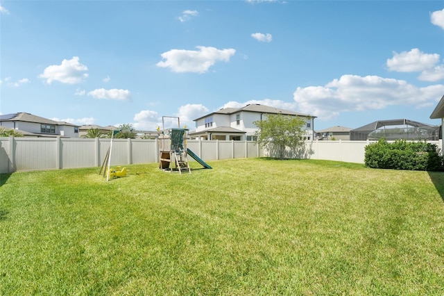 1741 Cherry Walk Rd, Lutz, FL 33558 - view of yard with a residential view, a playground, and a fenced backyard