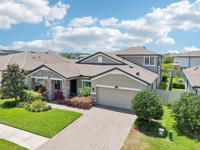1741 Cherry Walk Rd, Lutz, FL 33558 - craftsman inspired home with stucco siding, fence, decorative driveway, a garage, and stone siding