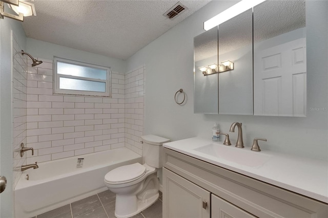 bathroom featuring a textured ceiling, visible vents, tile patterned flooring, vanity, and toilet