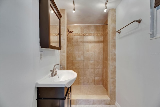 bathroom with vanity and a stall shower