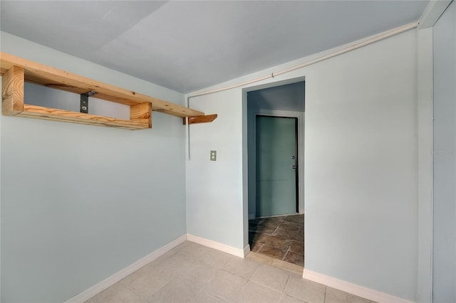 empty room with baseboards