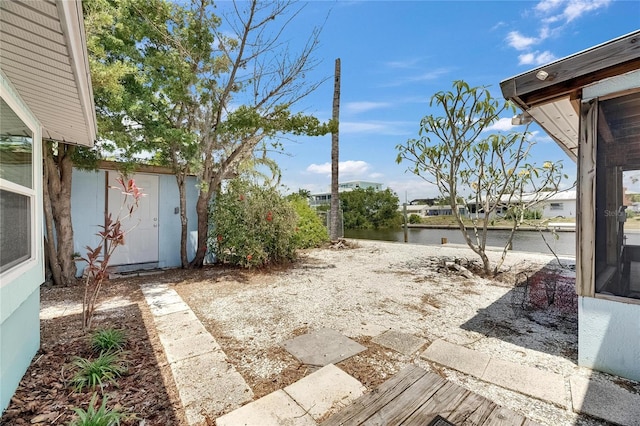 view of patio featuring a water view