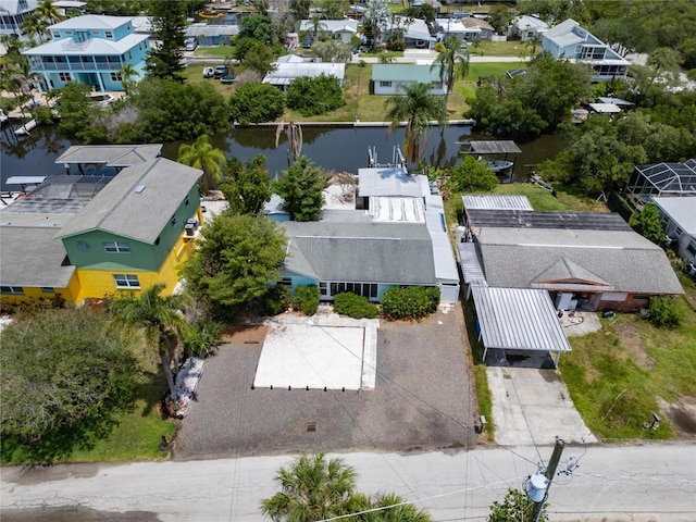 bird's eye view with a residential view and a water view