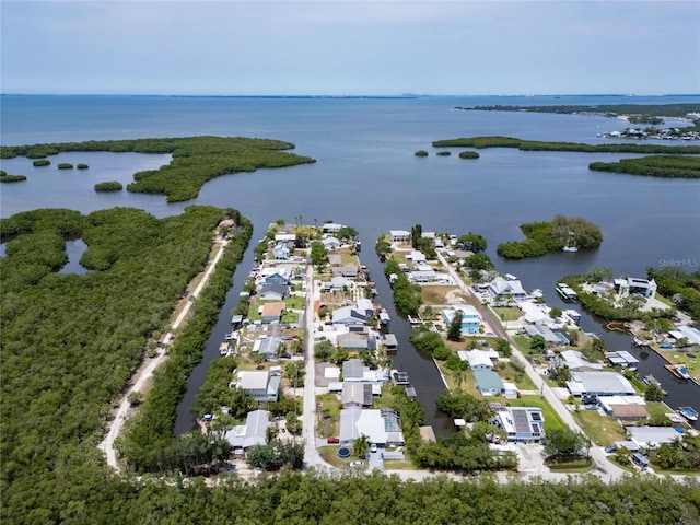birds eye view of property featuring a water view and a residential view