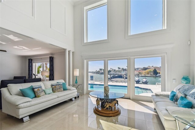 2233 Donato Dr, Belleair Beach, FL 33786 - living area with a water view and a towering ceiling