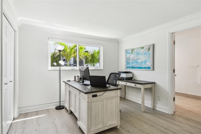 2233 Donato Dr, Belleair Beach, FL 33786 - home office featuring crown molding, baseboards, and light wood-style floors