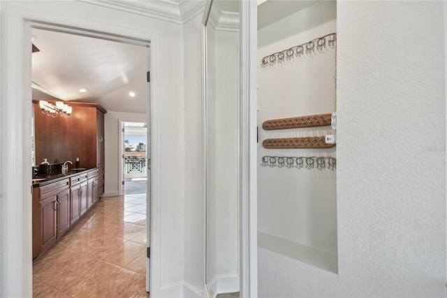 2233 Donato Dr, Belleair Beach, FL 33786 - bathroom with vanity, recessed lighting, an inviting chandelier, tile patterned flooring, and baseboards