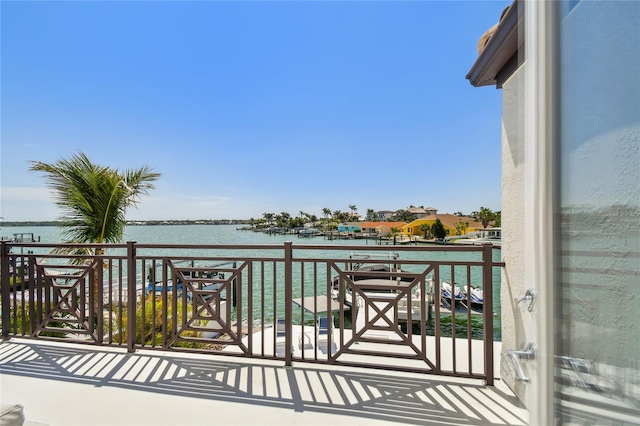 2233 Donato Dr, Belleair Beach, FL 33786 - view of patio / terrace with a water view and a balcony