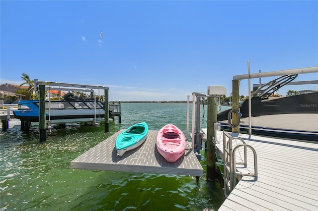 2233 Donato Dr, Belleair Beach, FL 33786 - view of dock featuring a water view and boat lift