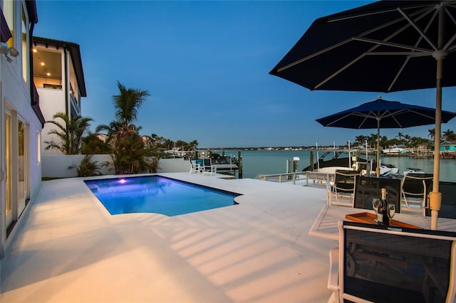 2233 Donato Dr, Belleair Beach, FL 33786 - pool with a dock, boat lift, a water view, and a patio
