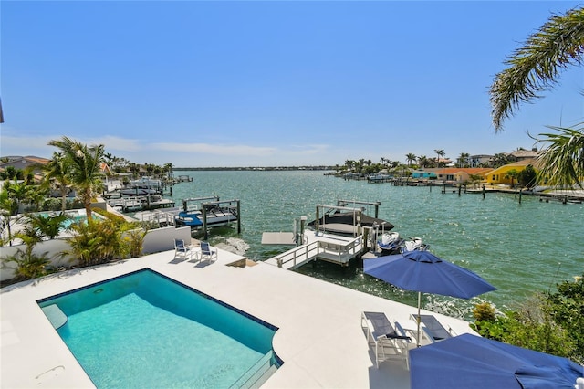2233 Donato Dr, Belleair Beach, FL 33786 - outdoor pool with a boat dock and a water view