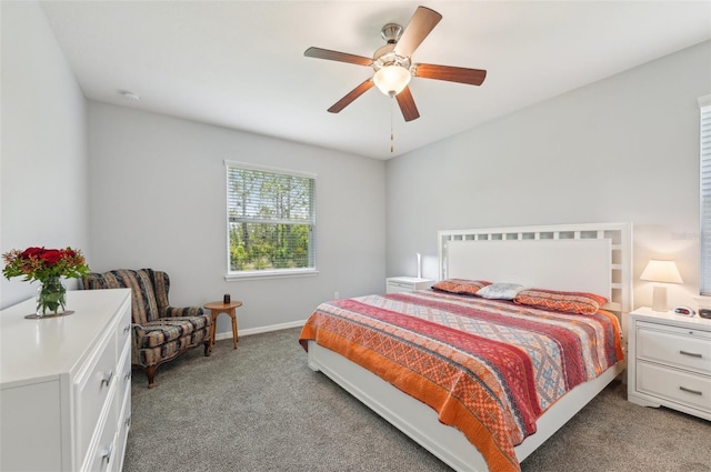 bedroom with baseboards, light carpet, and ceiling fan