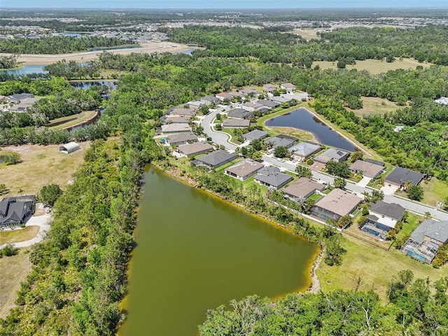 aerial view featuring a water view and a residential view
