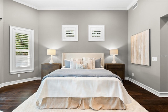 1600 Magnolia Rd, Belleair, FL 33756 - bedroom with wood-type flooring, baseboards, and ornamental molding