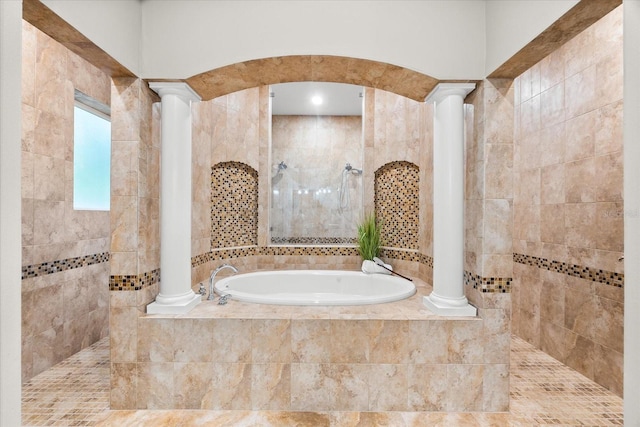 1600 Magnolia Rd, Belleair, FL 33756 - bathroom with decorative columns, a bath, and walk in shower
