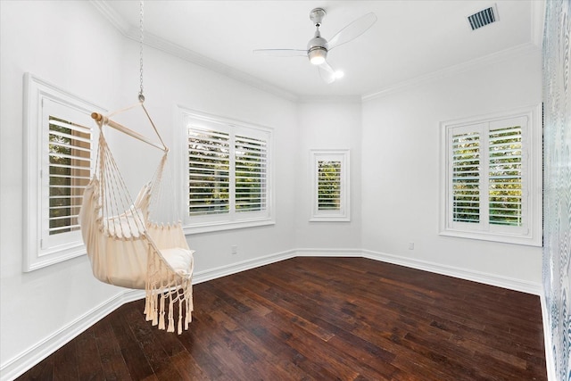 1600 Magnolia Rd, Belleair, FL 33756 - empty room with crown molding, hardwood / wood-style floors, ceiling fan, and baseboards