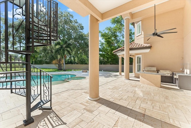 1600 Magnolia Rd, Belleair, FL 33756 - view of swimming pool with a patio area, a ceiling fan, a pool with connected hot tub, and a sink