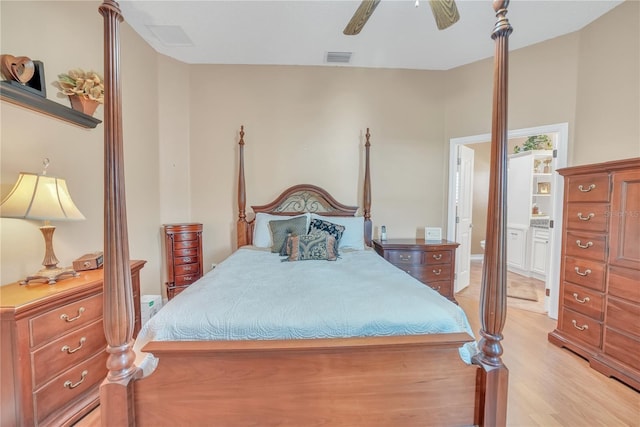 bedroom featuring visible vents, ceiling fan, and light wood-type flooring