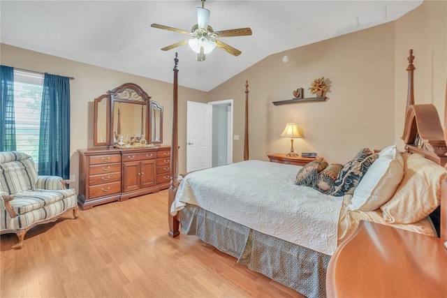 bedroom featuring light wood-style floors, ceiling fan, and vaulted ceiling