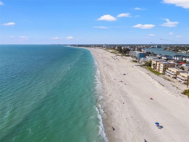 aerial view featuring a view of the beach and a water view