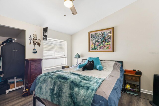 4306 La Mora Ct, Tampa, FL 33611 - bedroom featuring wood finished floors, ceiling fan, vaulted ceiling, and baseboards
